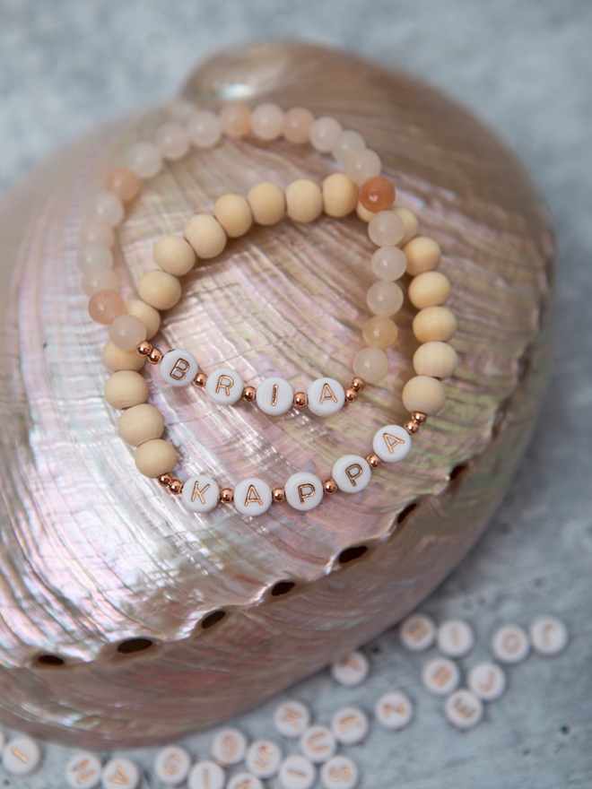 This detailed video tells you exactly how to make beaded name bracelets!