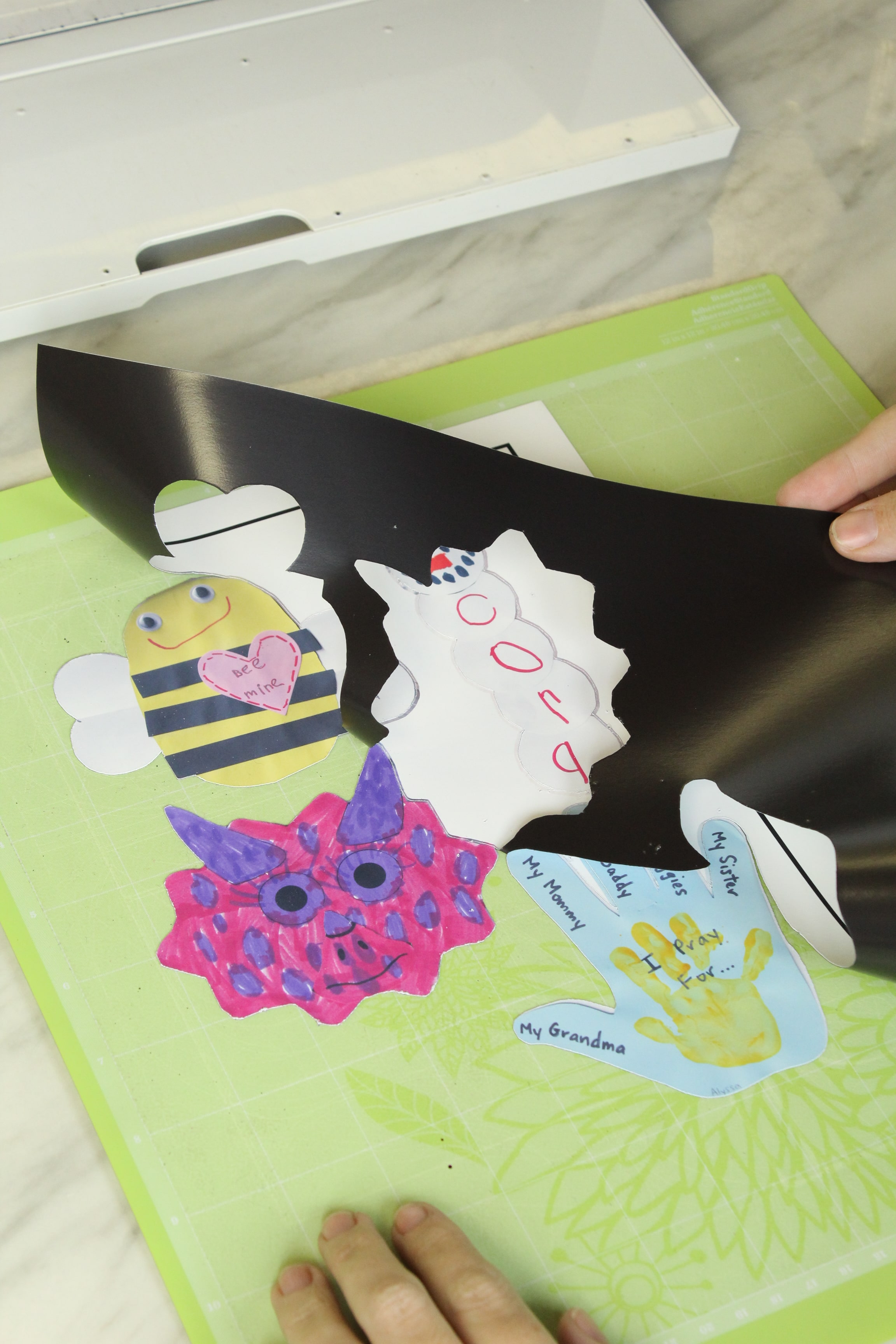 Turn your little one's artwork into magnets! You wont' want to miss this DIY!