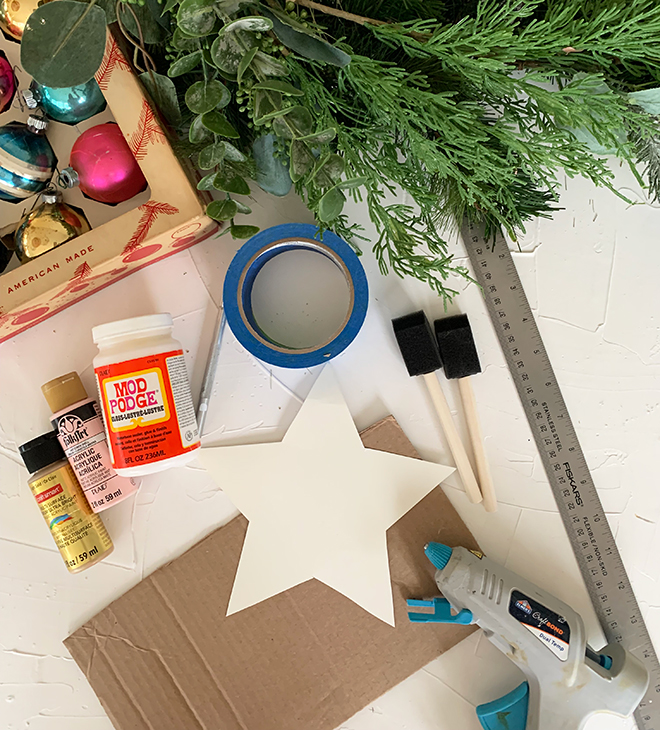 You have to check out this darling tree topper made out of recycled cardboard boxes!